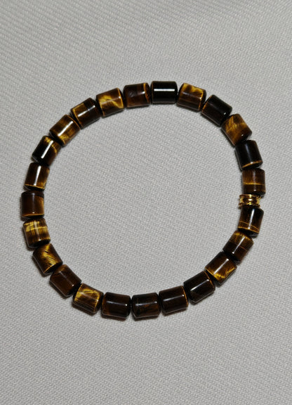 Bracelet Oeil de Tigre perle Tonnaux gros plan sur fond blanc