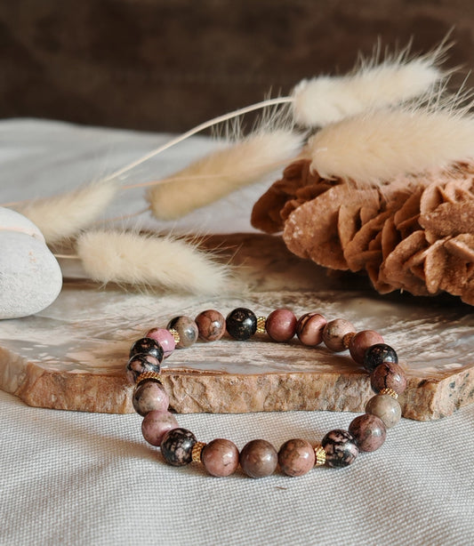 Bracelet Rhodochrosite sur support en roche blanche
